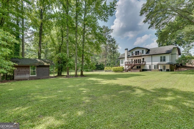 14440 Cogburn Rd, Alpharetta, GA 30004 - view of yard with stairs and a deck