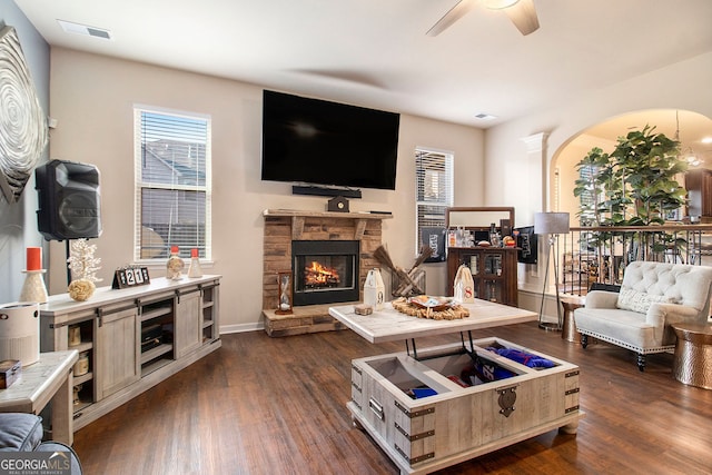 817 Nevis Way, Mcdonough, GA 30253 - living area featuring ceiling fan, plenty of natural light, a fireplace, and dark wood-type flooring