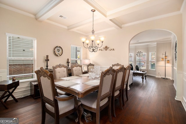 817 Nevis Way, Mcdonough, GA 30253 - dining area with arched walkways, dark wood finished floors, healthy amount of natural light, beamed ceiling, and a chandelier