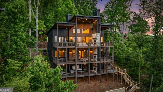 719 Ripshin Mountain Rd, Blue Ridge, GA 30513 - back of property featuring a chimney, stairs, and a balcony