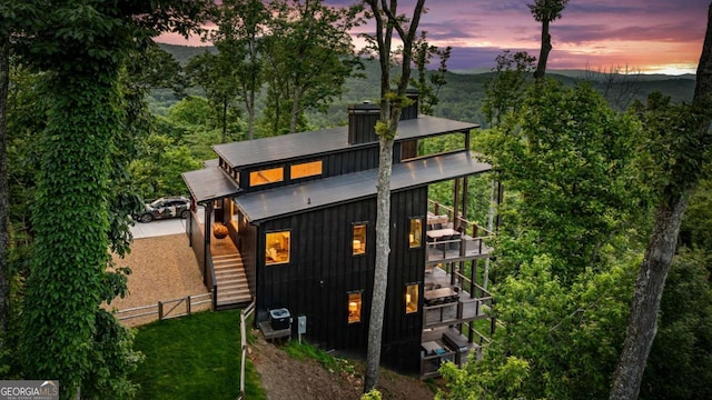 719 Ripshin Mountain Rd, Blue Ridge, GA 30513 - rear view of house featuring stairway and board and batten siding