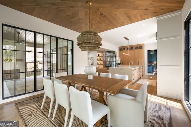 555 Orme Cir NE, Atlanta, GA 30306 - dining area with wooden ceiling, light wood-style floors, a chandelier, and lofted ceiling