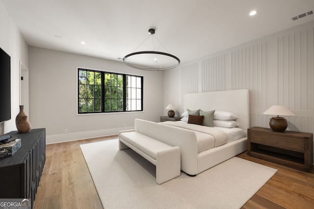 555 Orme Cir NE, Atlanta, GA 30306 - bedroom with baseboards, recessed lighting, and light wood finished floors