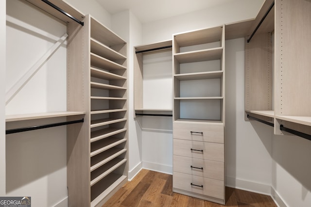 555 Orme Cir NE, Atlanta, GA 30306 - walk in closet featuring wood finished floors