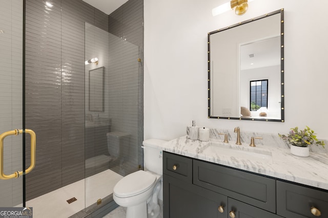 555 Orme Cir NE, Atlanta, GA 30306 - bathroom with vanity, toilet, and a shower stall