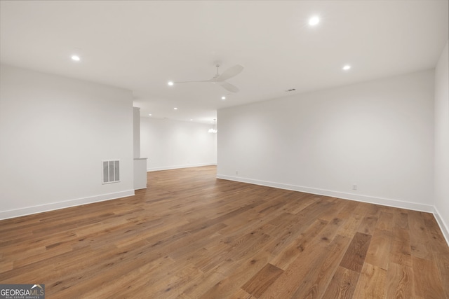 555 Orme Cir NE, Atlanta, GA 30306 - unfurnished room with a ceiling fan, recessed lighting, light wood finished floors, and baseboards