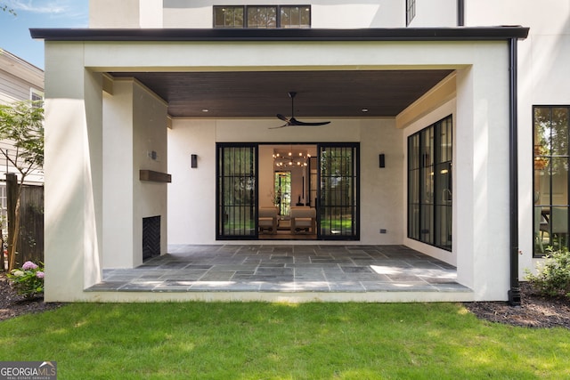 555 Orme Cir NE, Atlanta, GA 30306 - entrance to property featuring stucco siding and ceiling fan