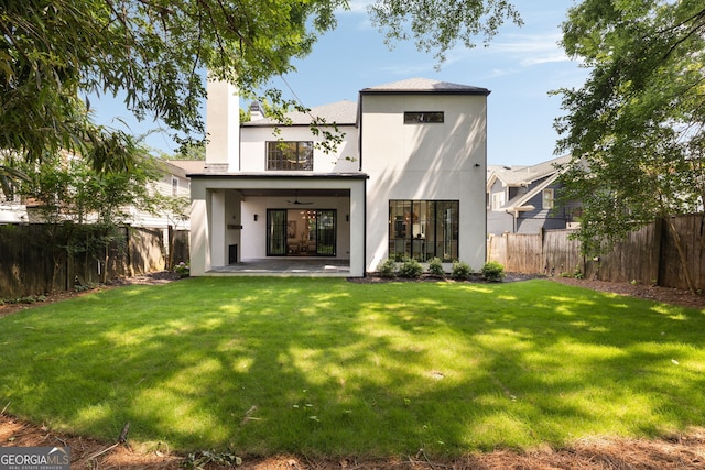 555 Orme Cir NE, Atlanta, GA 30306 - rear view of property featuring ceiling fan, stucco siding, a patio area, and a chimney