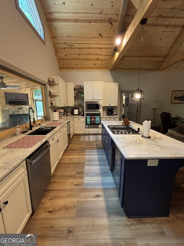 2726 Turkey Trot, Hiawassee, GA 30546 - kitchen featuring stainless steel appliances, open shelves, wood ceiling with exposed beams, white cabinets, and a sink
