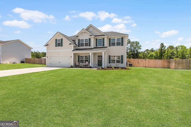 26 NE Sunflower Cir, Ludowici, GA 31316 - view of front of home featuring driveway, an attached garage, board and batten siding, and a porch