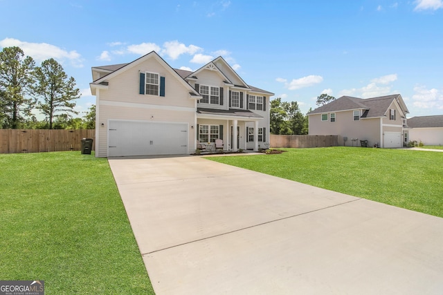 26 NE Sunflower Cir, Ludowici, GA 31316 - traditional-style home featuring driveway, a garage, and covered porch