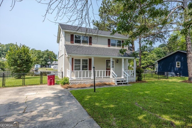 437 Edgewater Cir, Macon, GA 31220 - view of front facade with a porch, a shingled roof, and driveway