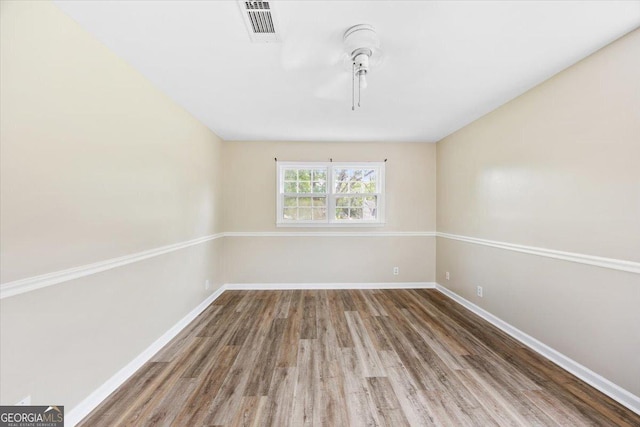 437 Edgewater Cir, Macon, GA 31220 - spare room featuring wood finished floors and baseboards