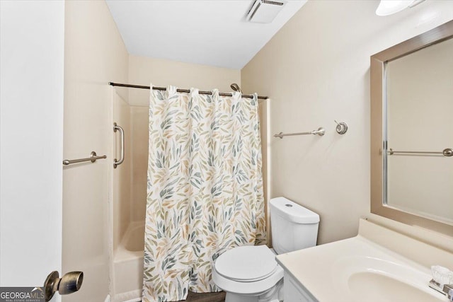 437 Edgewater Cir, Macon, GA 31220 - full bathroom with vanity, toilet, and shower / tub combo with curtain
