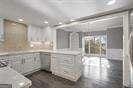 2769 Peachtree Rd NE Unit 10, Atlanta, GA 30305 - kitchen with finished concrete floors