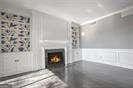 2769 Peachtree Rd NE Unit 10, Atlanta, GA 30305 - detailed view of a lit fireplace and wainscoting