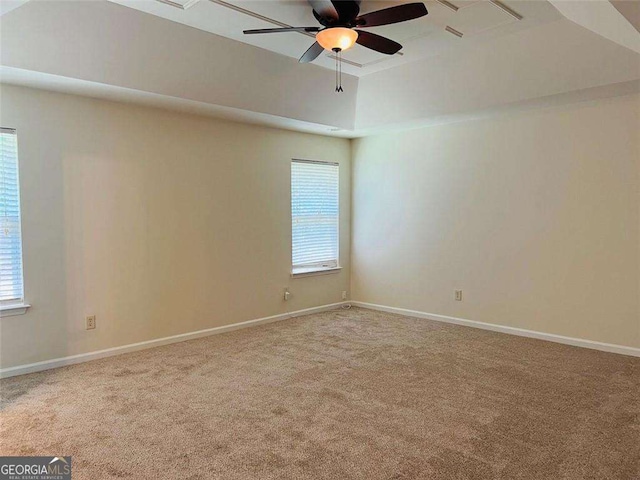 5123 Upper Elm St, Atlanta, GA 30349 - carpeted empty room featuring plenty of natural light, ceiling fan, and baseboards