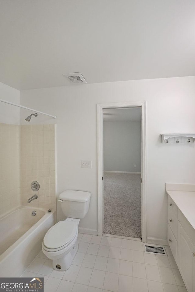 2394 Burch Cir NE, Brookhaven, GA 30319 - bathroom with toilet, washtub / shower combination, vanity, and tile patterned floors