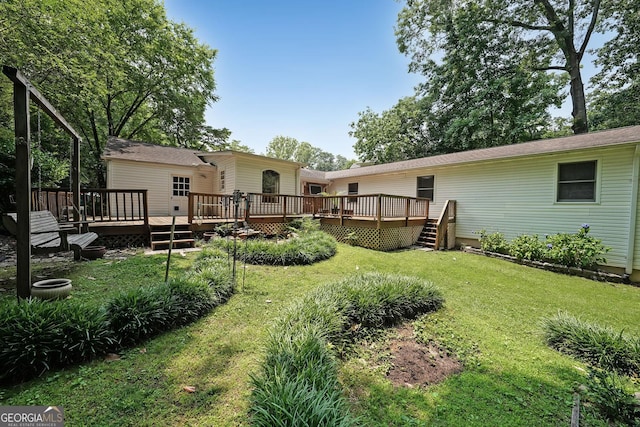 2394 Burch Cir NE, Brookhaven, GA 30319 - view of grassy yard with a deck