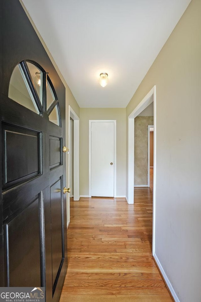 2394 Burch Cir NE, Brookhaven, GA 30319 - hallway with light wood finished floors