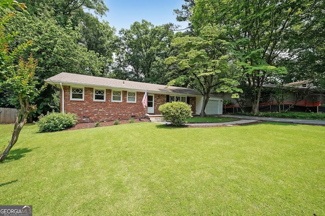2394 Burch Cir NE, Brookhaven, GA 30319 - view of front of home with crawl space, brick siding, a garage, and driveway