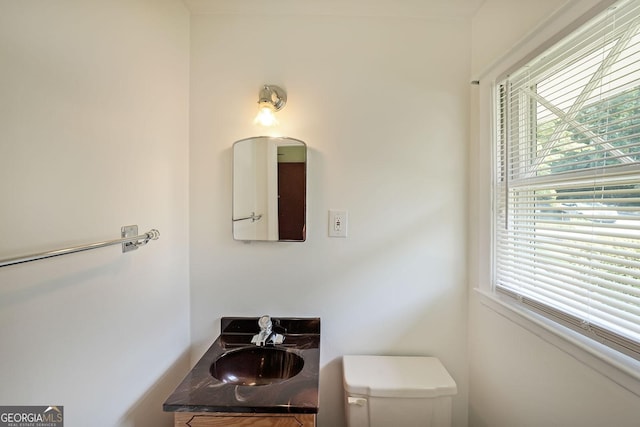 2394 Burch Cir NE, Brookhaven, GA 30319 - bathroom with toilet and vanity