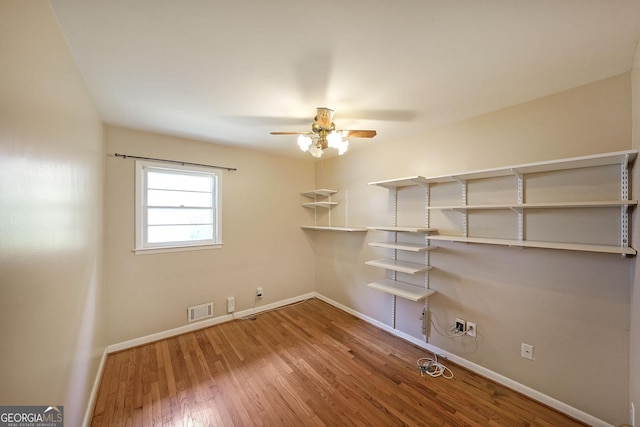 2394 Burch Cir NE, Brookhaven, GA 30319 - spare room featuring ceiling fan and wood finished floors