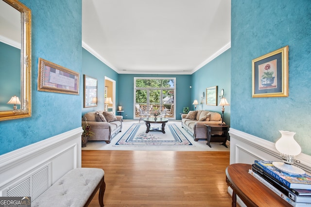 569 Fairway Dr, Woodstock, GA 30189 - living area featuring wood finished floors and ornamental molding