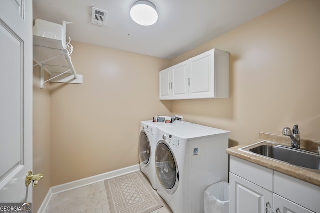 569 Fairway Dr, Woodstock, GA 30189 - laundry area with separate washer and dryer and cabinet space
