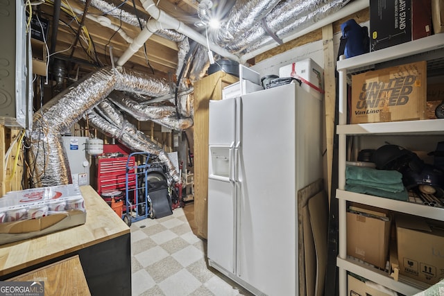 569 Fairway Dr, Woodstock, GA 30189 - unfinished below grade area featuring white fridge with ice dispenser, light flooring, and water heater