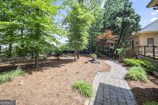 569 Fairway Dr, Woodstock, GA 30189 - view of yard featuring a wooden deck