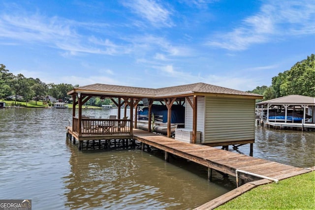 291 Thomas Dr, Eatonton, GA 31024 - dock area featuring boat lift and a water view