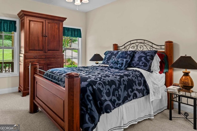291 Thomas Dr, Eatonton, GA 31024 - bedroom with light carpet and baseboards