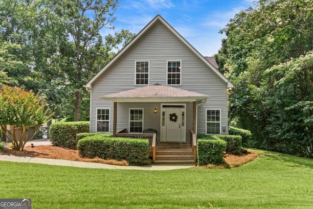 291 Thomas Dr, Eatonton, GA 31024 - view of front of property with a front lawn and a porch