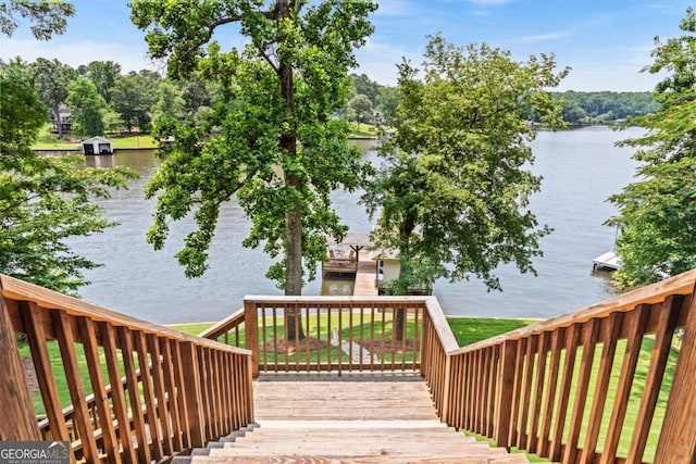 291 Thomas Dr, Eatonton, GA 31024 - wooden terrace with a water view