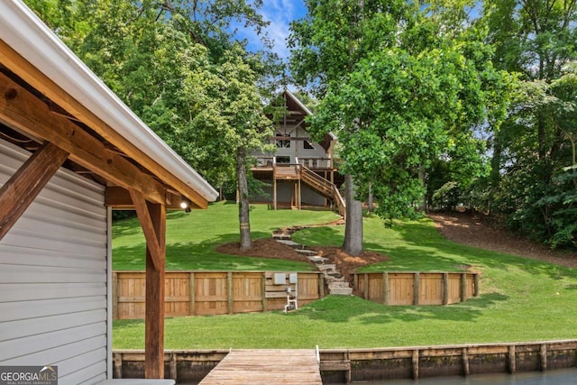 291 Thomas Dr, Eatonton, GA 31024 - view of yard with a wooden deck and stairway