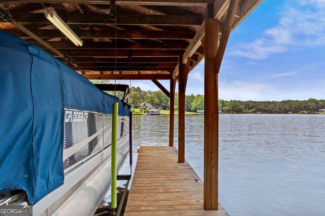 291 Thomas Dr, Eatonton, GA 31024 - dock featuring a water view