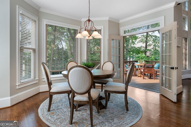 10135 High Falls Pointe, Johns Creek, GA 30022 - dining room with a chandelier, crown molding, wood finished floors, french doors, and baseboards