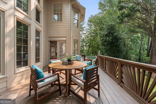10135 High Falls Pointe, Johns Creek, GA 30022 - wooden terrace featuring outdoor dining area