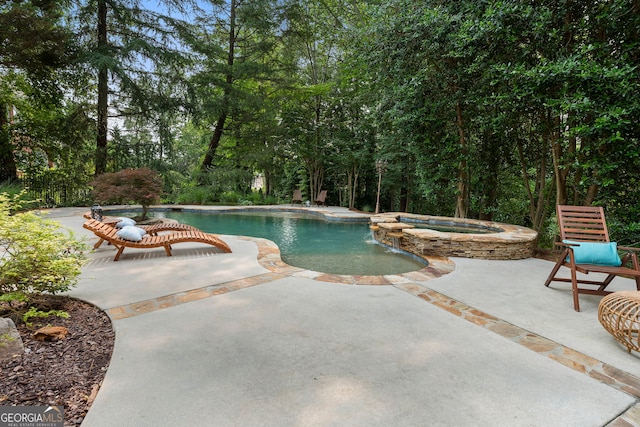 10135 High Falls Pointe, Johns Creek, GA 30022 - view of swimming pool with a patio area and a pool with connected hot tub