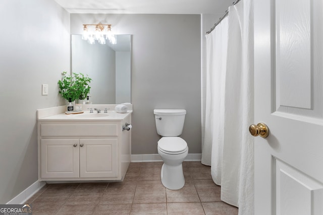 10135 High Falls Pointe, Johns Creek, GA 30022 - full bathroom with vanity, toilet, tile patterned flooring, and a shower with shower curtain