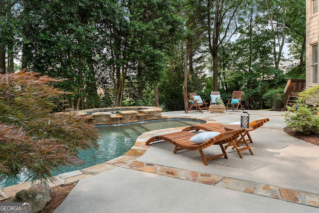 10135 High Falls Pointe, Johns Creek, GA 30022 - view of pool with a patio area and a pool with connected hot tub