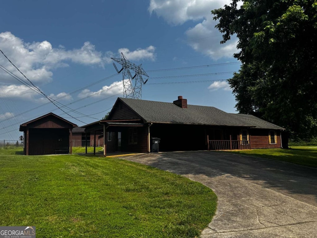 3105 Hamilton Mill Rd, Buford, GA 30519 - view of front of house with driveway, a front lawn, and a chimney