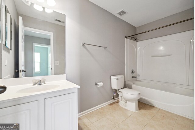 1875 Cutleaf Creek Rd, Grayson, GA 30017 - bathroom with toilet, vanity, tile patterned flooring, bathtub / shower combination, and baseboards