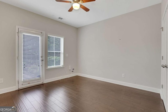 3005 Devoncroft St SE, Smyrna, GA 30080 - spare room with ceiling fan, baseboards, and wood finished floors