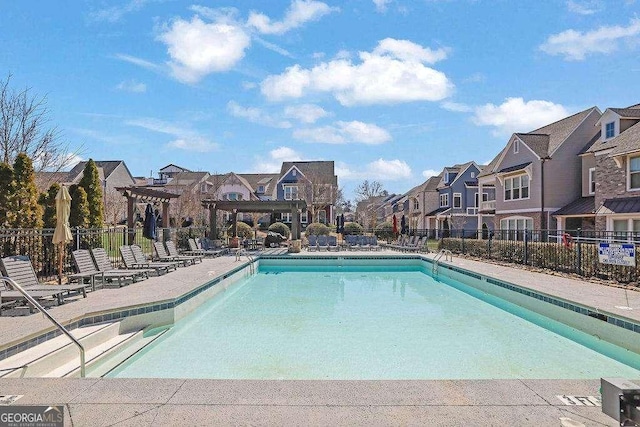 3005 Devoncroft St SE, Smyrna, GA 30080 - community pool with a residential view, a pergola, and a patio area