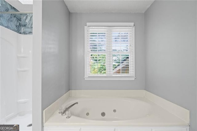 4956 Braeburn Trce NW, Acworth, GA 30102 - full bathroom featuring a tub with jets and a shower
