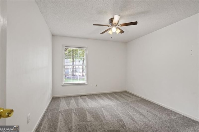 4956 Braeburn Trce NW, Acworth, GA 30102 - unfurnished room featuring a textured ceiling, carpet floors, a ceiling fan, and baseboards