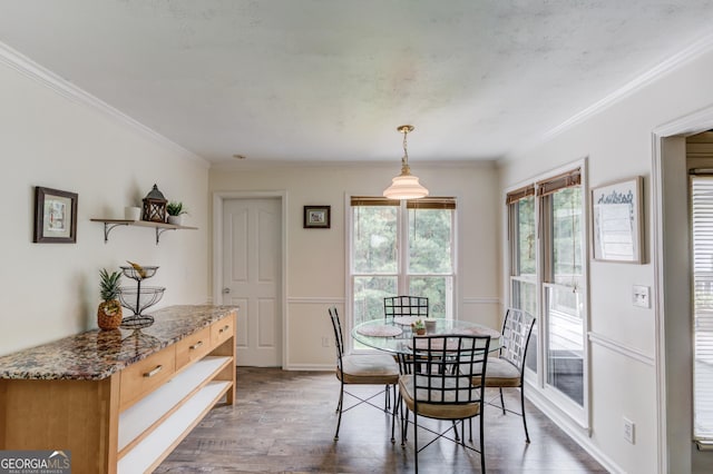 2005 Ashton Pointe Dr, Dacula, GA 30019 - dining area with wood finished floors, ornamental molding, and baseboards