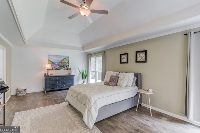 2005 Ashton Pointe Dr, Dacula, GA 30019 - bedroom featuring a raised ceiling, wood finished floors, baseboards, and a ceiling fan
